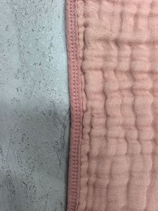 Four-thread overlock on the towel edge